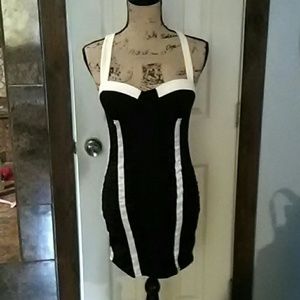 Black and white form fitting dress.